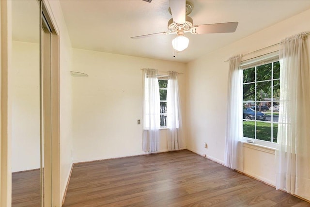 6009 Belfast Dr, Austin, TX 78723 - empty room featuring wood finished floors and a ceiling fan