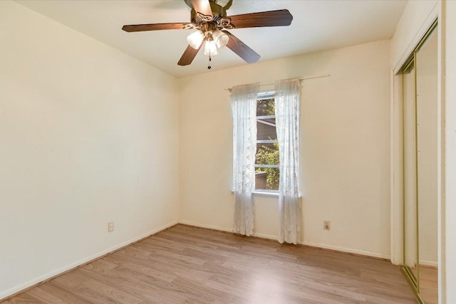 6009 Belfast Dr, Austin, TX 78723 - unfurnished bedroom with light wood-style flooring, baseboards, a closet, and ceiling fan
