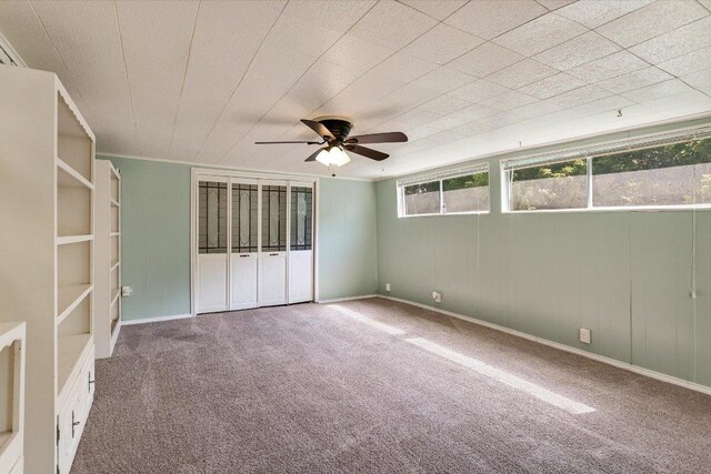 6009 Belfast Dr, Austin, TX 78723 - unfurnished bedroom featuring carpet floors and ceiling fan