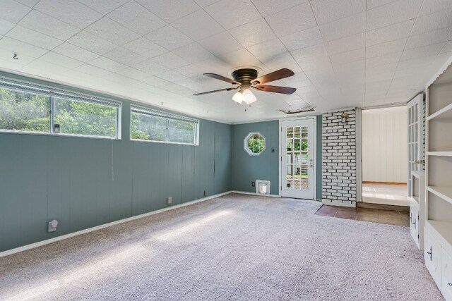 6009 Belfast Dr, Austin, TX 78723 - carpeted spare room with a ceiling fan and baseboards