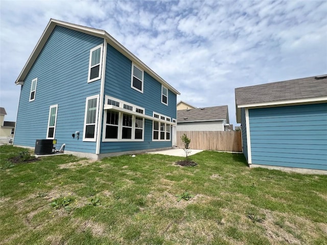 431 Ferrule Dr, Kyle, TX 78640 - rear view of house with central air condition unit and a patio
