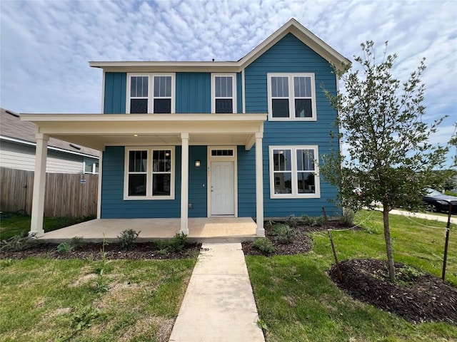 431 Ferrule Dr, Kyle, TX 78640 - traditional-style house featuring a porch and board and batten siding