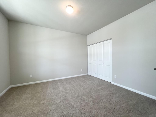 431 Ferrule Dr, Kyle, TX 78640 - unfurnished bedroom featuring carpet, baseboards, and a closet
