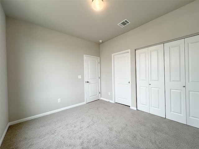 431 Ferrule Dr, Kyle, TX 78640 - unfurnished bedroom featuring carpet flooring, baseboards, and a closet