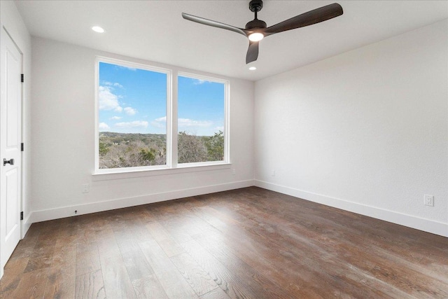 114 Shady Bluff Dr, Wimberley, TX 78676 - spare room with a ceiling fan, wood finished floors, baseboards, and recessed lighting