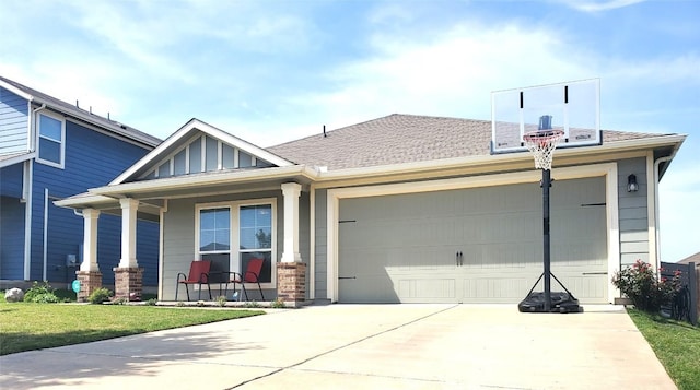 130 Navidad River Dr, Hutto, TX 78634 - view of front of house with covered porch, driveway, an attached garage, and roof with shingles