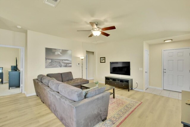 130 Navidad River Dr, Hutto, TX 78634 - living room featuring light wood-style flooring and ceiling fan