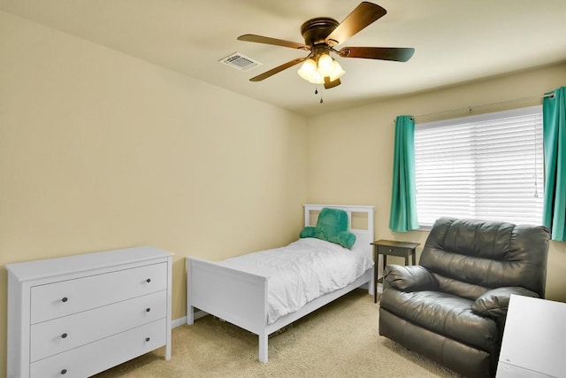 130 Navidad River Dr, Hutto, TX 78634 - bedroom featuring light carpet and a ceiling fan