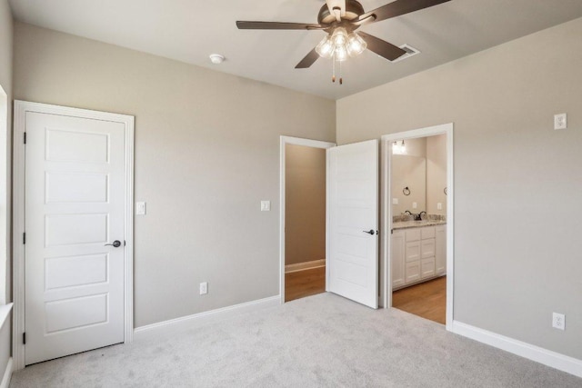 4007 Aerie St, Salado, TX 76571 - unfurnished bedroom featuring light carpet, baseboards, ensuite bath, and a sink