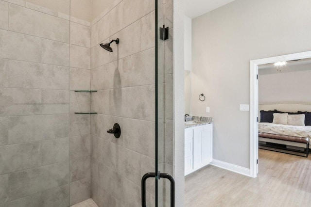 4007 Aerie St, Salado, TX 76571 - full bath featuring a shower stall, wood finished floors, ensuite bathroom, baseboards, and vanity