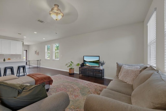 106 Mary Max Cv, San Marcos, TX 78666 - living area featuring dark wood-type flooring, baseboards, recessed lighting, and a ceiling fan