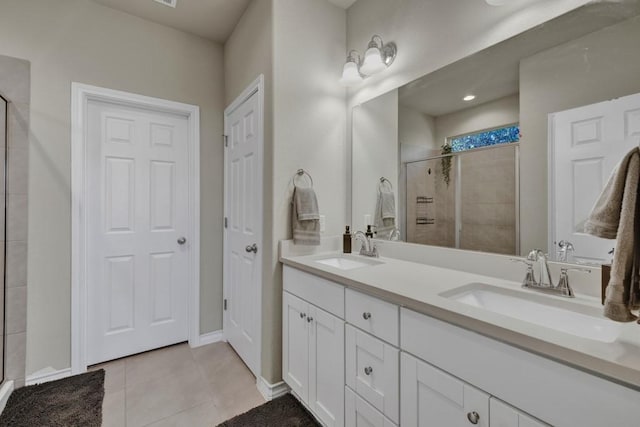 106 Mary Max Cv, San Marcos, TX 78666 - full bath with a shower stall, double vanity, tile patterned floors, and baseboards