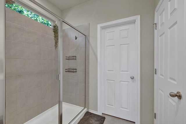 106 Mary Max Cv, San Marcos, TX 78666 - full bathroom featuring a shower stall and tile patterned floors
