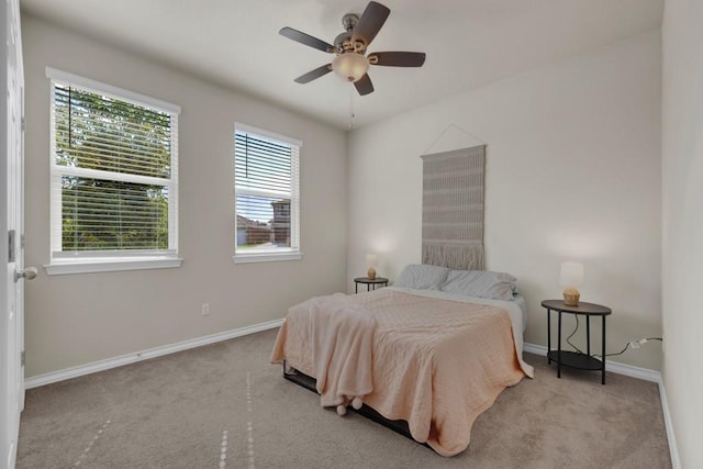 106 Mary Max Cv, San Marcos, TX 78666 - carpeted bedroom with baseboards and a ceiling fan