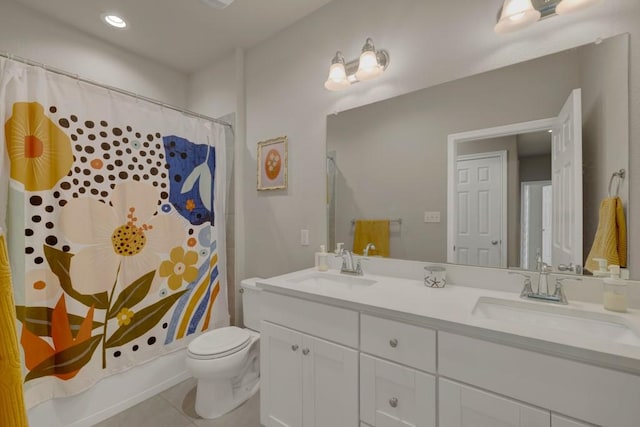 106 Mary Max Cv, San Marcos, TX 78666 - full bath featuring toilet, double vanity, tile patterned floors, and shower / tub combo