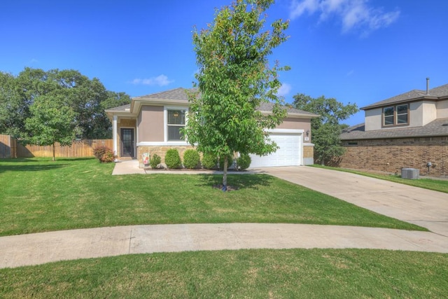 106 Mary Max Cv, San Marcos, TX 78666 - view of front of property with concrete driveway, a garage, stucco siding, and cooling unit