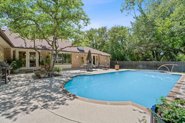 10109 Vaquero Trl, Austin, TX 78759 - view of pool featuring french doors, a patio area, and a fenced backyard