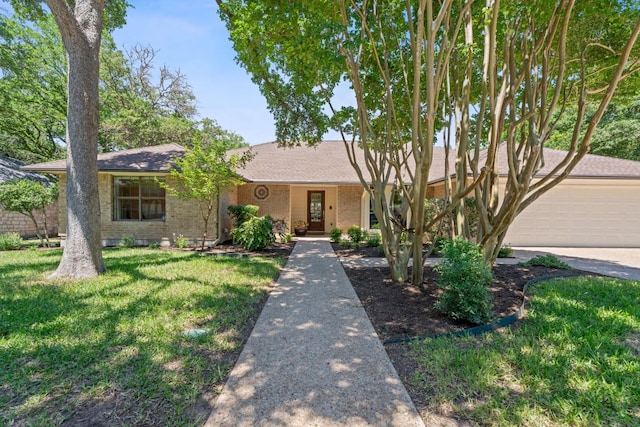 10109 Vaquero Trl, Austin, TX 78759 - ranch-style home featuring a front yard, brick siding, and a shingled roof