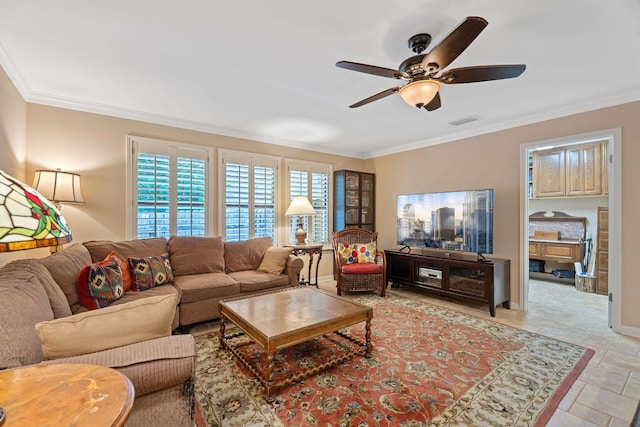 10109 Vaquero Trl, Austin, TX 78759 - living area with crown molding, a ceiling fan, and baseboards