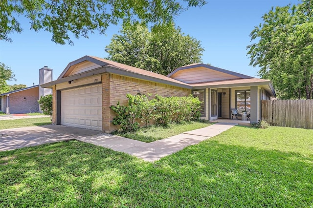1711 Provident Ln, Round Rock, TX 78664 - view of front of property with concrete driveway, brick siding, an attached garage, a porch, and a chimney