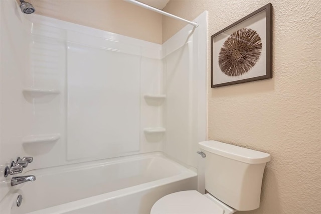 1711 Provident Ln, Round Rock, TX 78664 - full bath featuring a textured wall, toilet, and washtub / shower combination