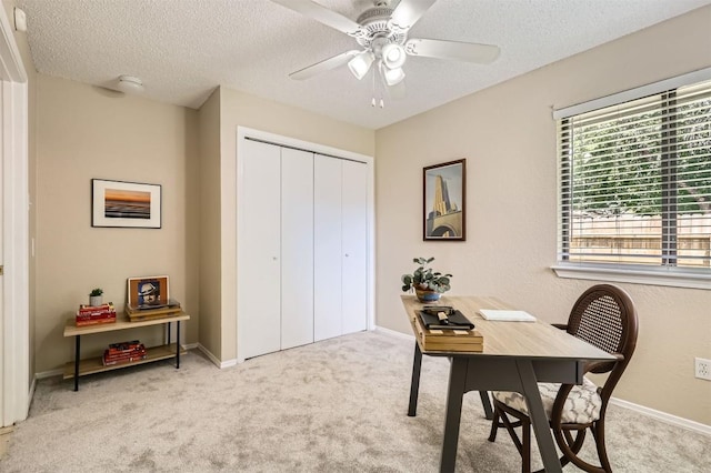 1711 Provident Ln, Round Rock, TX 78664 - office area with light carpet, a ceiling fan, a textured ceiling, and baseboards