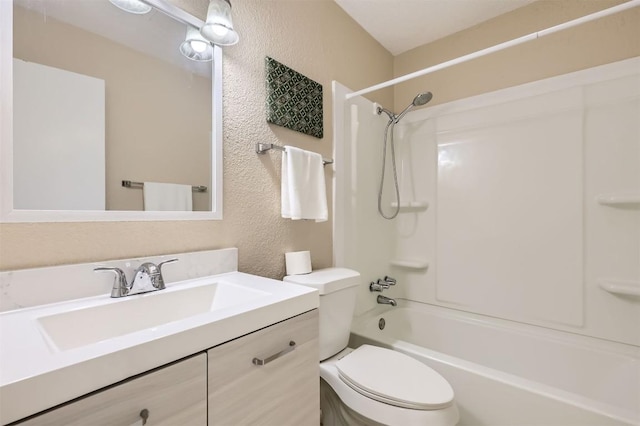 1711 Provident Ln, Round Rock, TX 78664 - full bath with a textured wall, toilet, vanity, and shower / bath combination