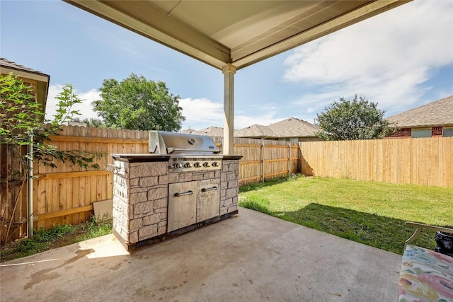 view of patio / terrace featuring area for grilling and exterior kitchen
