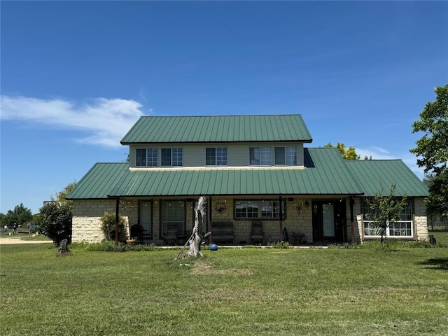 21424 Martin Ln, Pflugerville, TX 78660 - view of front of home featuring stone siding and a front yard