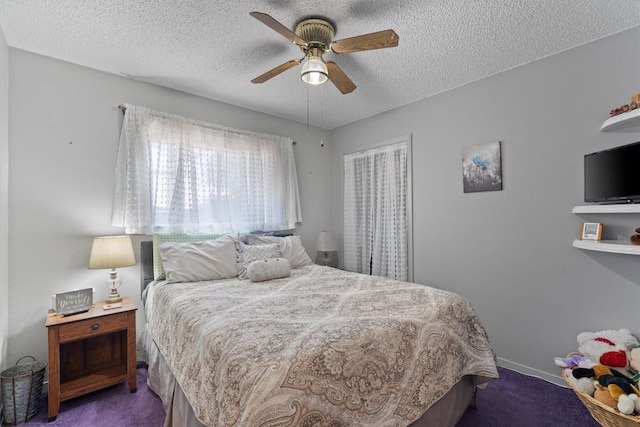 carpeted bedroom with a textured ceiling, ceiling fan, and baseboards