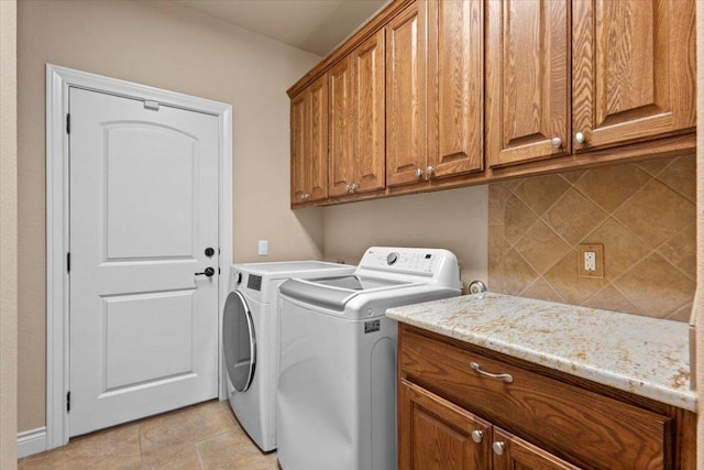 5124 Hidden Springs Trl, Georgetown, TX 78633 - washroom with cabinet space and washer and dryer