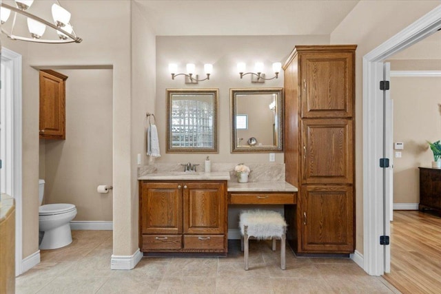5124 Hidden Springs Trl, Georgetown, TX 78633 - full bathroom featuring vanity, toilet, and baseboards