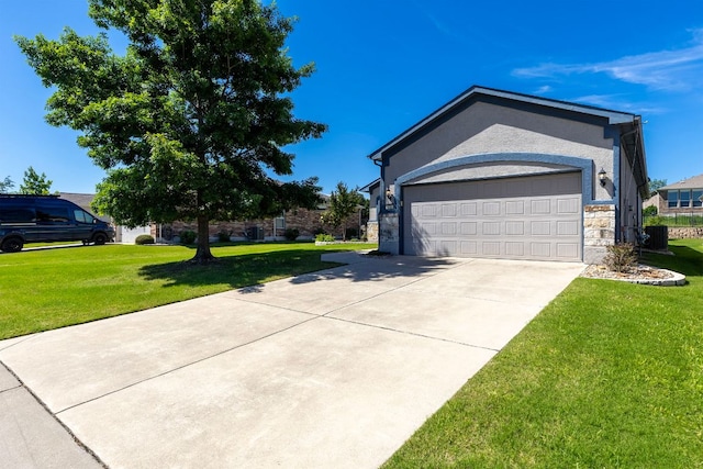 126 Cathedral Mountain Pass, Georgetown, TX 78633 - view of front of home featuring stone siding, a front lawn, driveway, a garage, and central AC unit