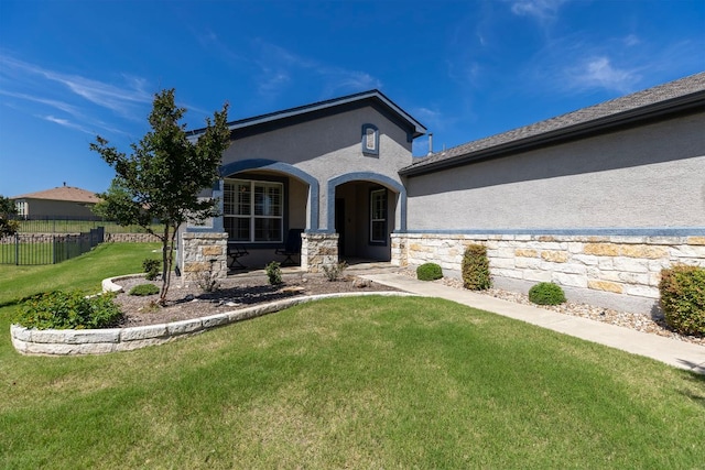 126 Cathedral Mountain Pass, Georgetown, TX 78633 - view of front facade with stucco siding, stone siding, and covered porch
