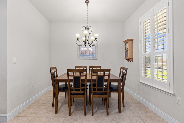 126 Cathedral Mountain Pass, Georgetown, TX 78633 - dining space featuring light tile patterned flooring, a chandelier, and baseboards