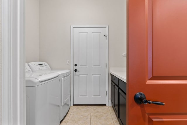126 Cathedral Mountain Pass, Georgetown, TX 78633 - clothes washing area featuring separate washer and dryer and light tile patterned floors