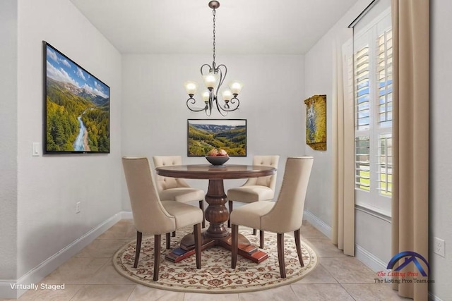 126 Cathedral Mountain Pass, Georgetown, TX 78633 - tiled dining area featuring a chandelier and baseboards