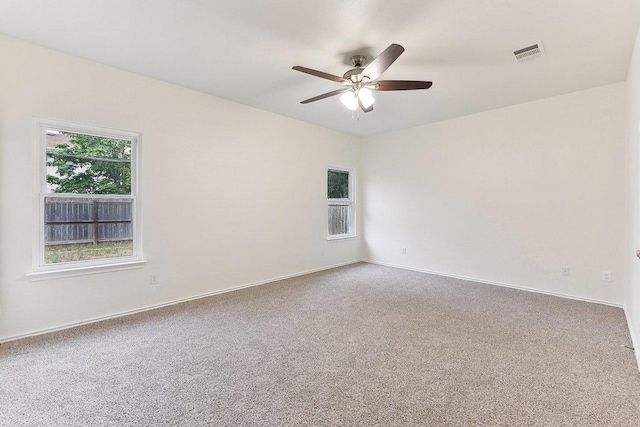 13213 Marie Ln, Manor, TX 78653 - carpeted spare room with ceiling fan and baseboards