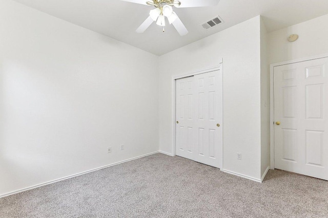 13213 Marie Ln, Manor, TX 78653 - unfurnished bedroom with carpet floors, baseboards, a closet, and a ceiling fan