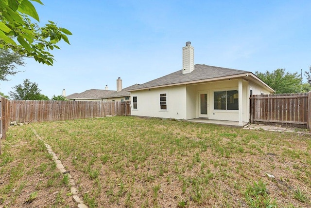 13213 Marie Ln, Manor, TX 78653 - back of house with stucco siding
