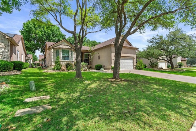 409 Rio Grande Loop, Georgetown, TX 78633 - view of front of property featuring a garage, stucco siding, concrete driveway, and a front yard