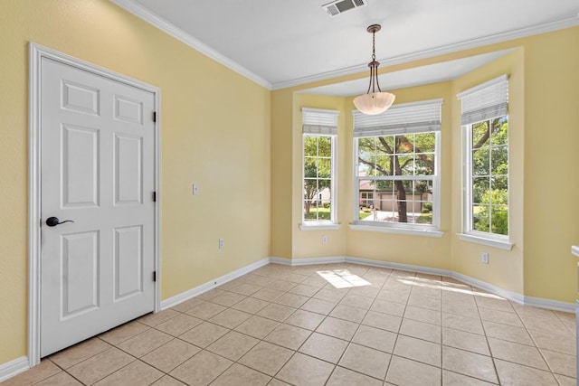 409 Rio Grande Loop, Georgetown, TX 78633 - spare room featuring crown molding, light tile patterned floors, and baseboards