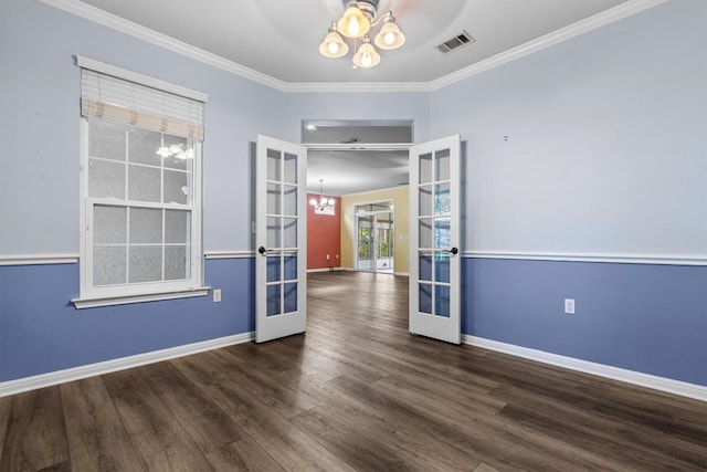 409 Rio Grande Loop, Georgetown, TX 78633 - unfurnished room with french doors, ornamental molding, wood finished floors, baseboards, and ceiling fan