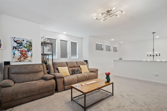 208 Dycus Bnd, Liberty Hill, TX 78642 - living room featuring a chandelier, light carpet, and recessed lighting