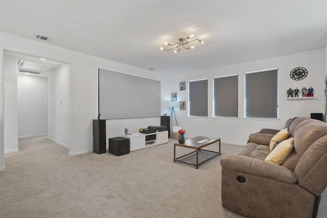 carpeted living area featuring baseboards