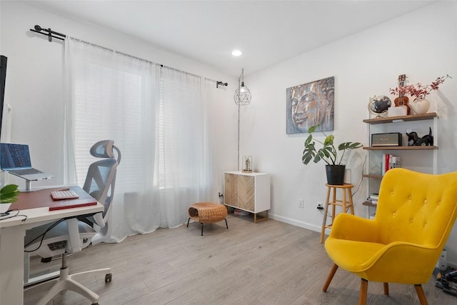 office space featuring wood finished floors, baseboards, and recessed lighting