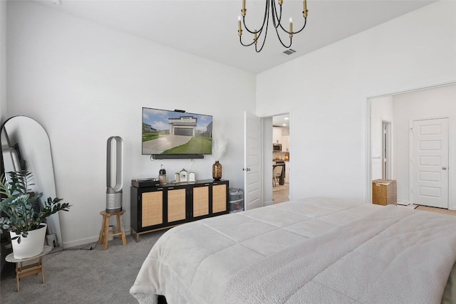 208 Dycus Bnd, Liberty Hill, TX 78642 - bedroom with a chandelier and carpet