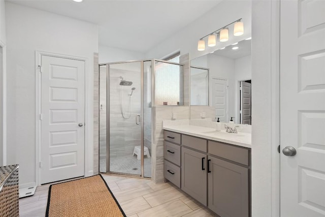 208 Dycus Bnd, Liberty Hill, TX 78642 - bathroom with vanity and a shower stall