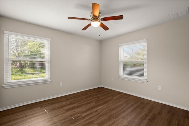 4603 Englewood Dr, Austin, TX 78745 - unfurnished room with plenty of natural light, wood finished floors, and ceiling fan