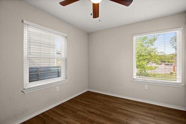 4603 Englewood Dr, Austin, TX 78745 - spare room with a ceiling fan, baseboards, and dark wood-style floors